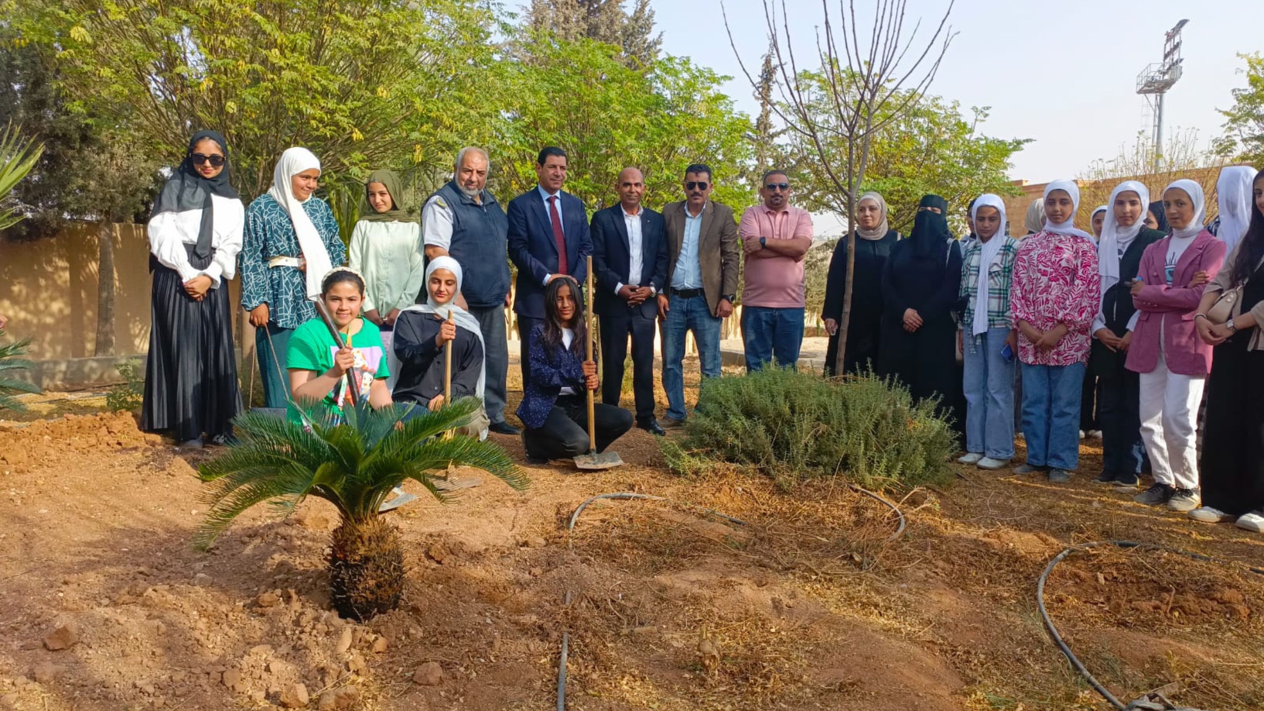 شباب ذيبان النموذجي ينفذون برنامج &quot;التطوع الأخضر&quot;